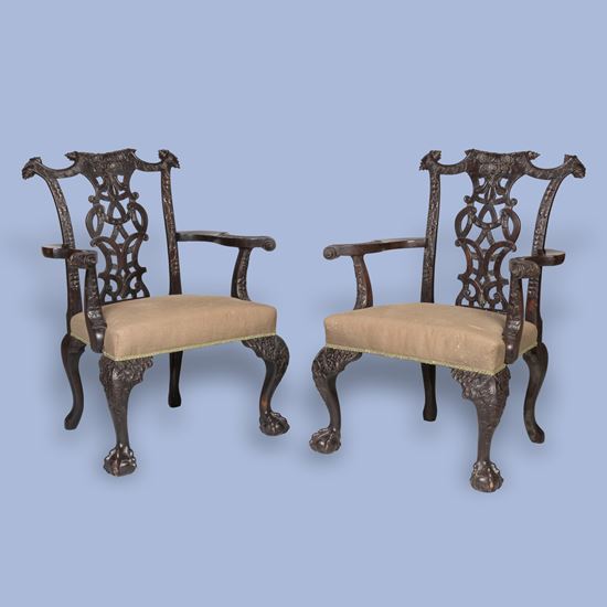A Pair of Mahogany Carved Armchairs in the Chippendale Manner